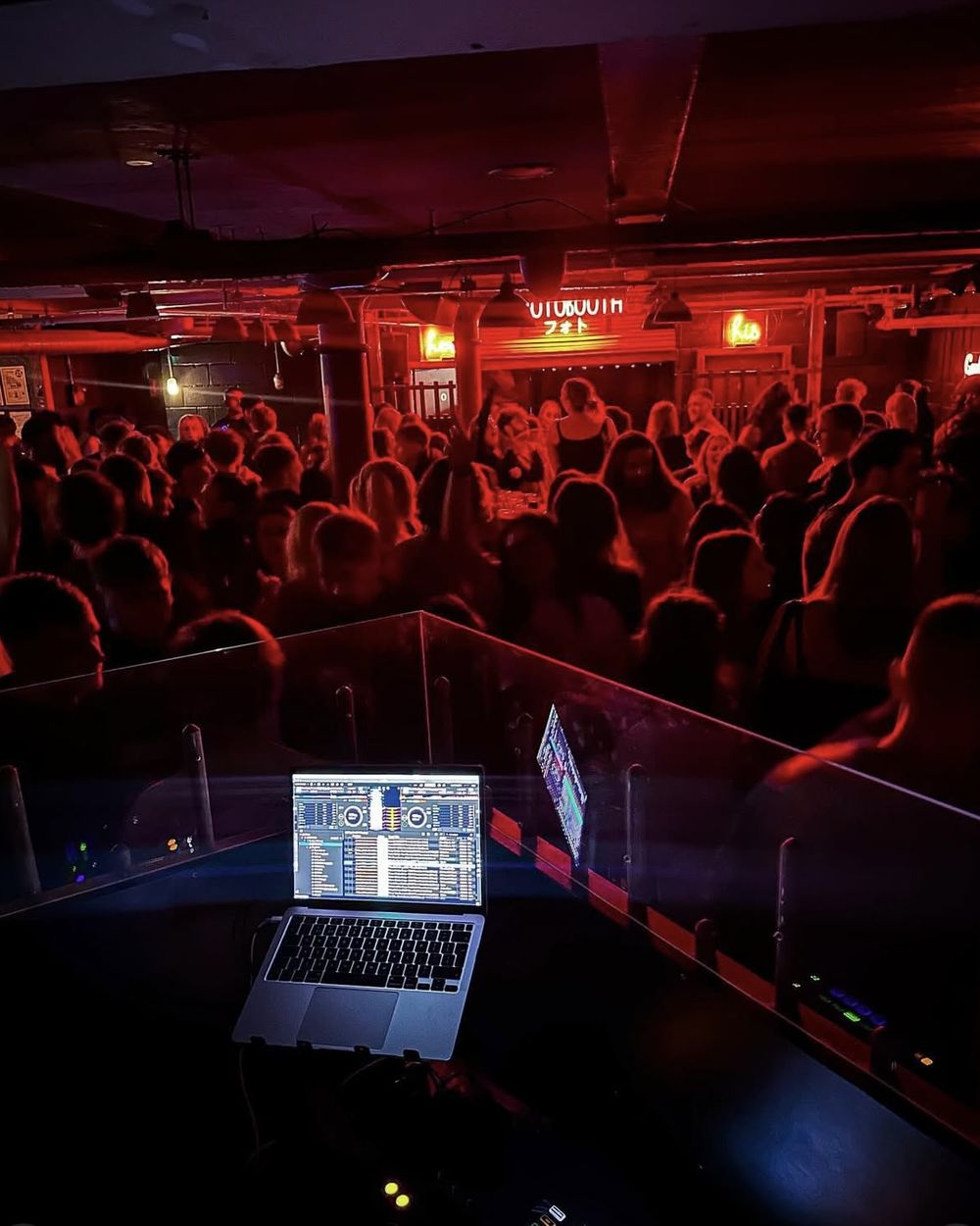Crowd dancing to the DJ
